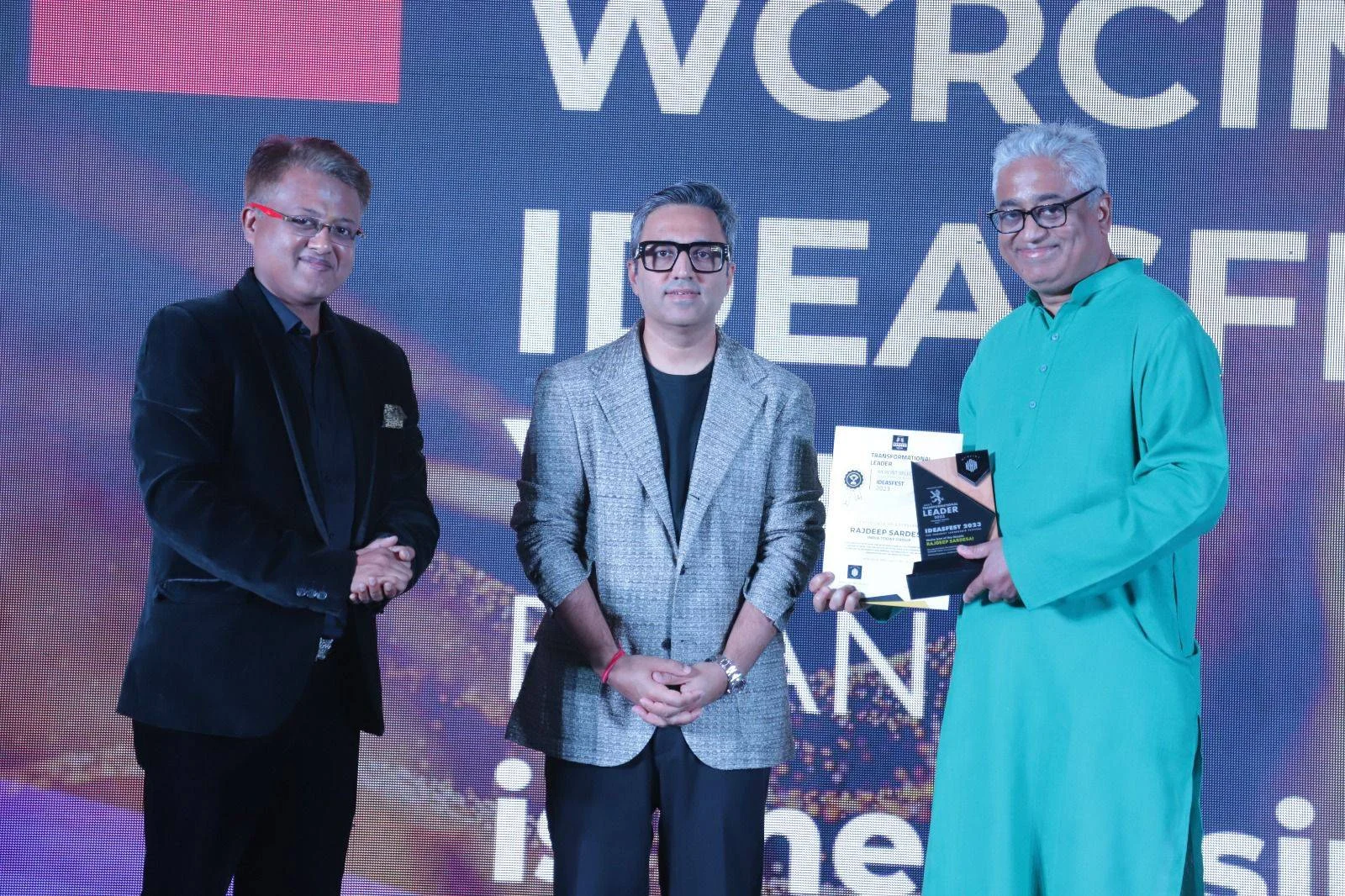 WCRC Leaders awards — journalist Rajdeep Sardesai receiving the Transformational Leader award at WCRCINT IDEASFEST 2023 alongside Ashneer Grover