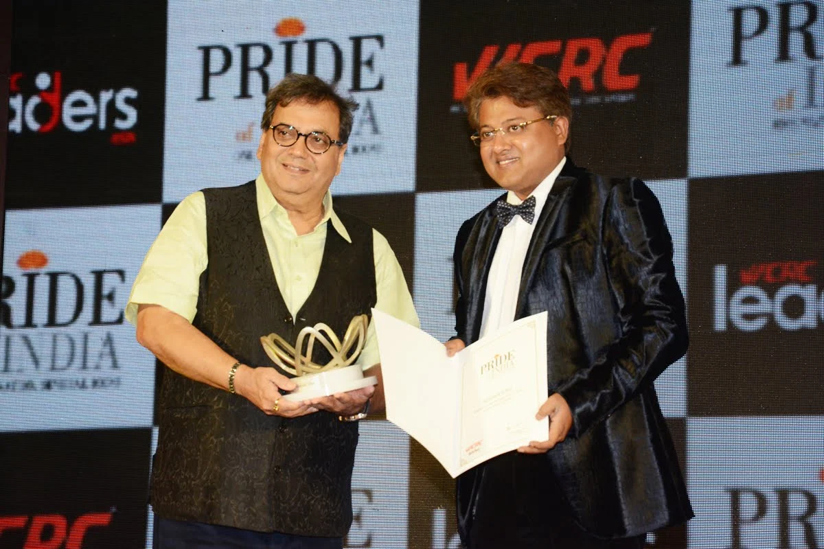 WCRC Leaders awards — filmmaker Subhash Ghai receiving the PRIDE of India trophy and citation on stage